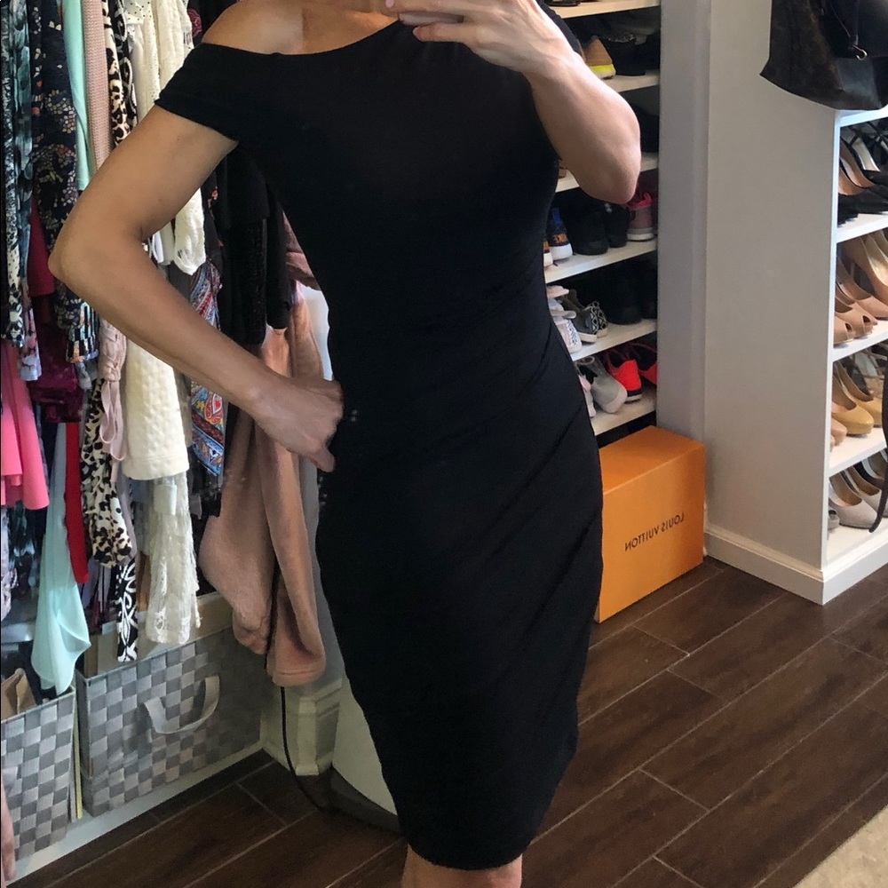 BeBe size small off one shoulder black dress